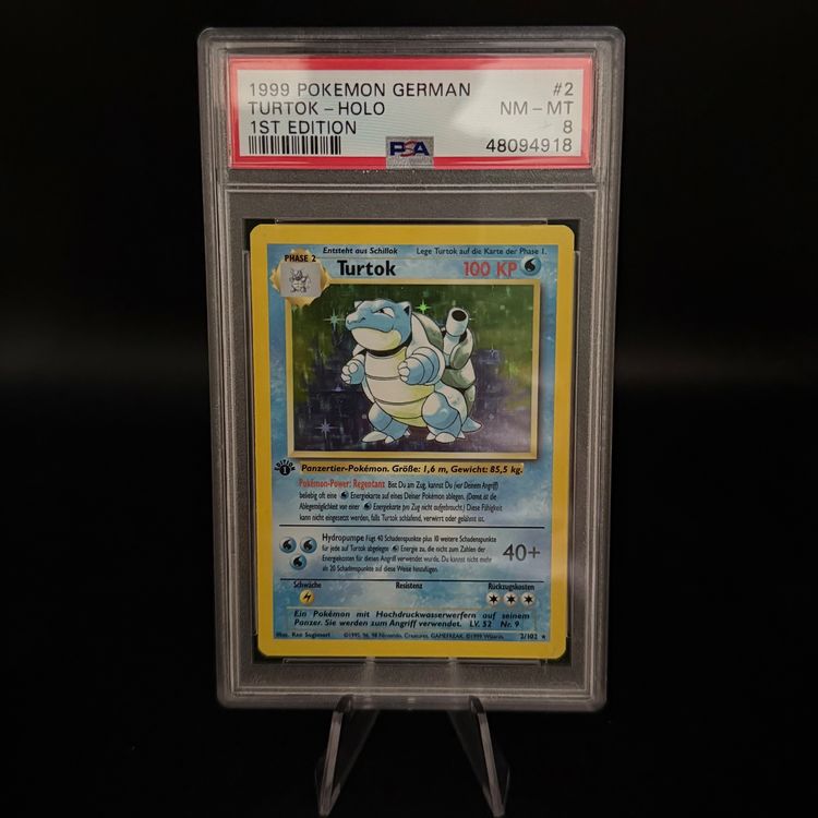 Pokémon Turtok Holo 1st Edition Karte, PSA 8 NM, aus dem Jahr 1999, grenzwertig in Mint-Zustand, detailreiche Kartengrafik